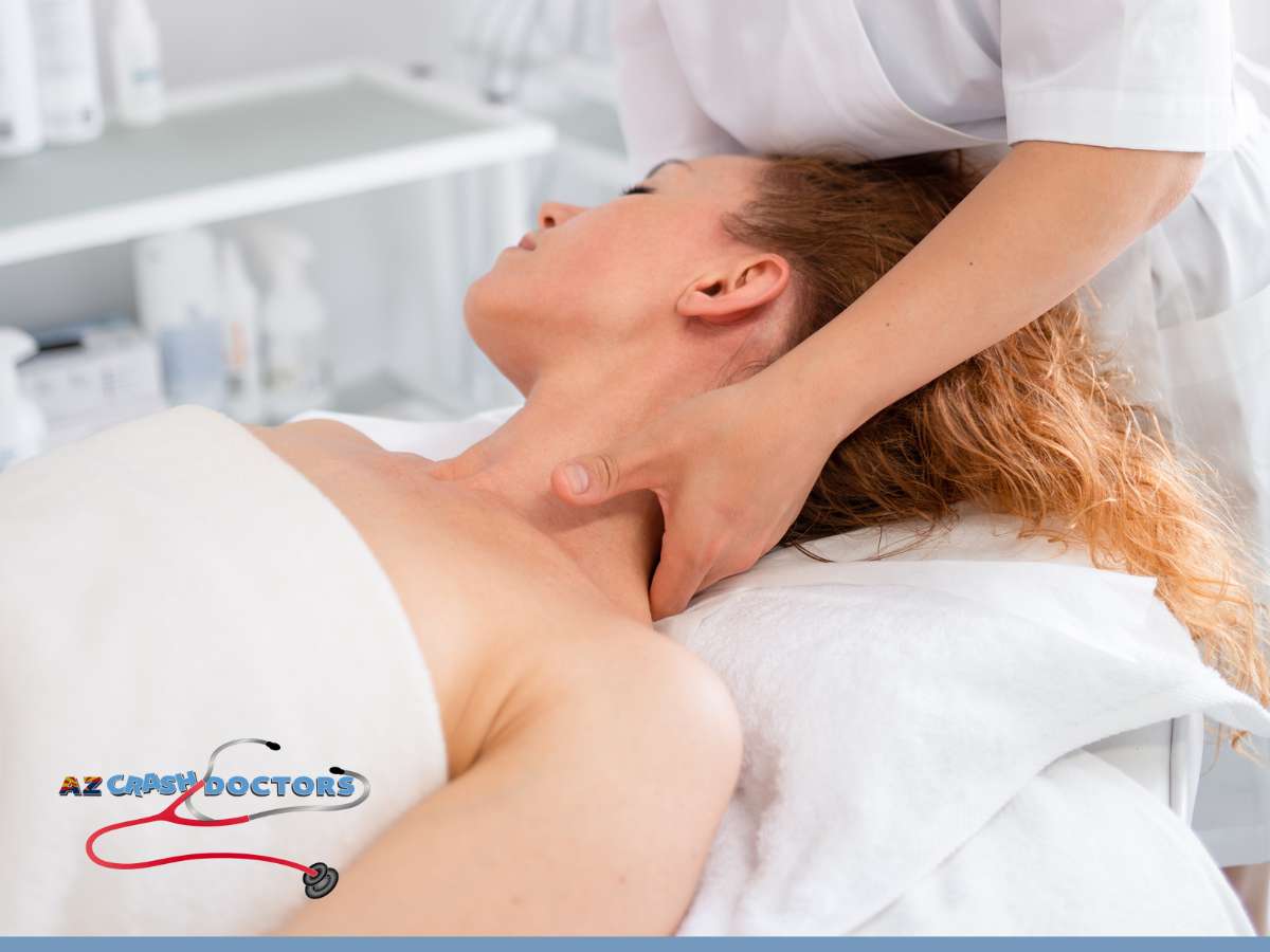 Chiropractor treating a woman for headaches after a car accident, focusing on neck pain relief.