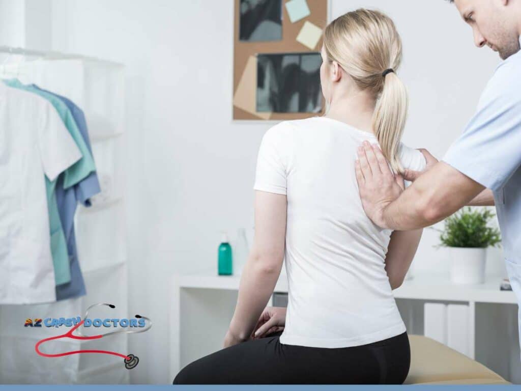 Chiropractor using effective chiropractic techniques to treat a woman's spinal injury.